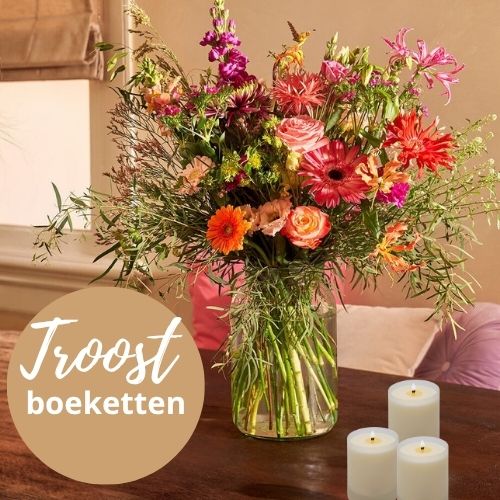 Troostboeket met rode rozen en lelies voor een condoleance in Echt